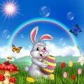Cartoon rabbit holding an Easter egg with nature background Royalty Free Stock Photo