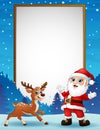 Cartoon reindeer and santa claus with blank board Royalty Free Stock Photo