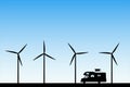 Cartoon retro car between windmills on road Royalty Free Stock Photo