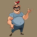 Cartoon smiling muscular man in a cap says gesticulating Royalty Free Stock Photo