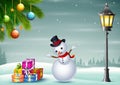 Cartoon of snowman with boxes gift under lamp post on snow Royalty Free Stock Photo