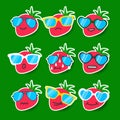 Cartoon strawberry emojis with sunglasses.