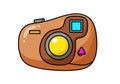 Cartoon-style illustration of a brown compact camera with a large yellow lens. A small Royalty Free Stock Photo