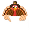 Cartoon Thanksgiving Turkey Bird Mascot Character Holding A Blank Sign Royalty Free Stock Photo