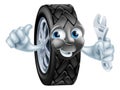 Cartoon tire mascot with wrench