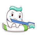 Cartoon tooth holding toothbrush and squeezing the toothpaste.