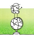 Cartoon traveller standing on a globe