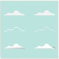 Cartoon white clouds on blue sky for design Royalty Free Stock Photo