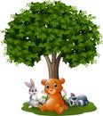 Cartoon wild animals under the tree