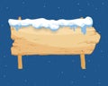 Cartoon wooden winter sign with snow cap vector illustration. Snowy sign board. Wood directional arrow, snow covered