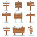 Cartoon wooden winter signs with snow caps set vector illustration. Royalty Free Stock Photo