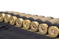 Cartridge belt with cartridges for a double-barrel rifle, on a white background Royalty Free Stock Photo