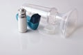 Cartridge inhaler and chamber and mask isolated white elevated v
