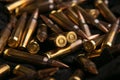 Cartridges for automatic carbine caliber .223 on charcoal. Ammunition for automatic and semi-automatic rifles. Dark back