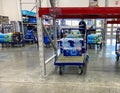 Carts full of cases of bottles of water at a Sams Club wholesale store due to the people panicking and hoarding water products