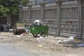 Carts full of trash in the street of Phnom Penh
