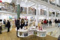 Tourists and local people seeking books in Carturesti Library