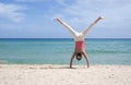 Cartwheel on the beach Royalty Free Stock Photo