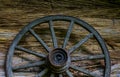 Cartwheel at the old sraw wall of a house Royalty Free Stock Photo