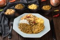 Caruru. Traditional Afro-Brazilian dish made with okra and dried shrimp, accompanied by vatapa, beans, rice, shrimp and farofa