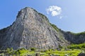 Carved buddha image on the cliff