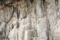 Carved Buddha sculpture in Longmen Grottoes Royalty Free Stock Photo