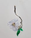 Carved chalcedon flower with carved jadeite leaves in gold