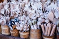 Carved cups, spoons, forks and other utensils of wood Royalty Free Stock Photo