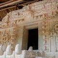 Carved facade of an ancient Mayan temple, in the archaeological area of Ek Balam