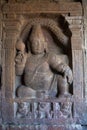 Carved figure of Sankhanidhi, a semi divine being, left panel, Eastern entrance, Virupaksha Temple