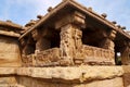 Carved figures and floral patterns on the decorated sober and square pillars of the sabha-mandapa of Lad Khan temple, Aihole, Baga Royalty Free Stock Photo