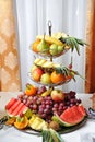 Carved fruits arrangement. Fresh various fruits. Assortment of exotic fruits.