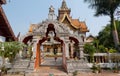 Carved gate to ancient Buddhist temple structure in Thailand Royalty Free Stock Photo