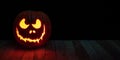 Carved halloween pumpkin with candle inside