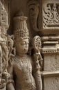 Carved idol on the inner wall of Rani ki vav, an intricately constructed stepwell on the banks of Saraswati River. Patan in Royalty Free Stock Photo