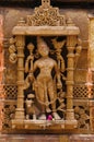 Carved idol on the outer wall, Hatkeshwar Mahadev, 17th century temple, the family deity of Nagar Brahmins. Vadnagar, Gujarat