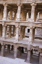 Carved idols on the inner wall of Rani ki vav, an intricately constructed stepwell on the banks of Saraswati River. Patan, Gujara Royalty Free Stock Photo