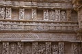 Carved idols on the inner wall of Rani ki vav, an intricately constructed stepwell on the banks of Saraswati River. Patan, Gujara Royalty Free Stock Photo