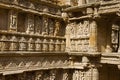 Carved idols on the inner wall of Rani ki vav, an intricately constructed stepwell on the banks of Saraswati River. Patan, Gujara Royalty Free Stock Photo