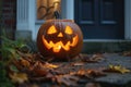 carved and illuminated jack-o-lantern on a doorstep