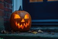 carved and illuminated jack-o-lantern on a doorstep