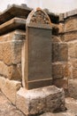 Carved inscriptions in Kannada on the stone pillar, Eradukatte Basadi, Chandragiri hill, Sravanabelgola, Karnataka.