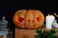 Carved Jack-o-lantern pumpkin at Halloween theme