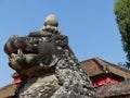 Carved lion on Basantapur Chowk, Bhaktapur