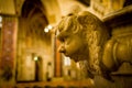 Carved marble head on side of cathedral altar