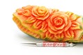 Carved papaya fruit and knife Royalty Free Stock Photo