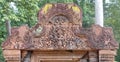 Carved pediment over doorway at Banteay Srei temple is a story of Narasimha Vishnu god as lion claws Hiranyakasipu