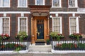 The carved porch of the Noon Group Building. Westminster, London, UK