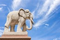 Carved sandstone elephant on blue sky background