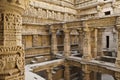 Carved sandstone pillars of Rani-ki-Vav step well, India